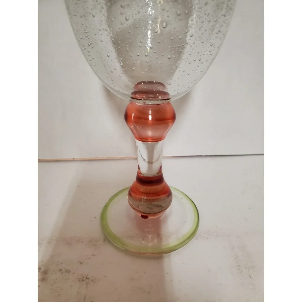 Pottery Barn wine glass featuring Bubble Effect Bowl And Pink Stem W/green Rim
